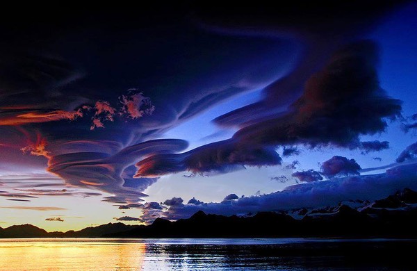 Amazing shot of lenticular clouds over Lake Crowley, California